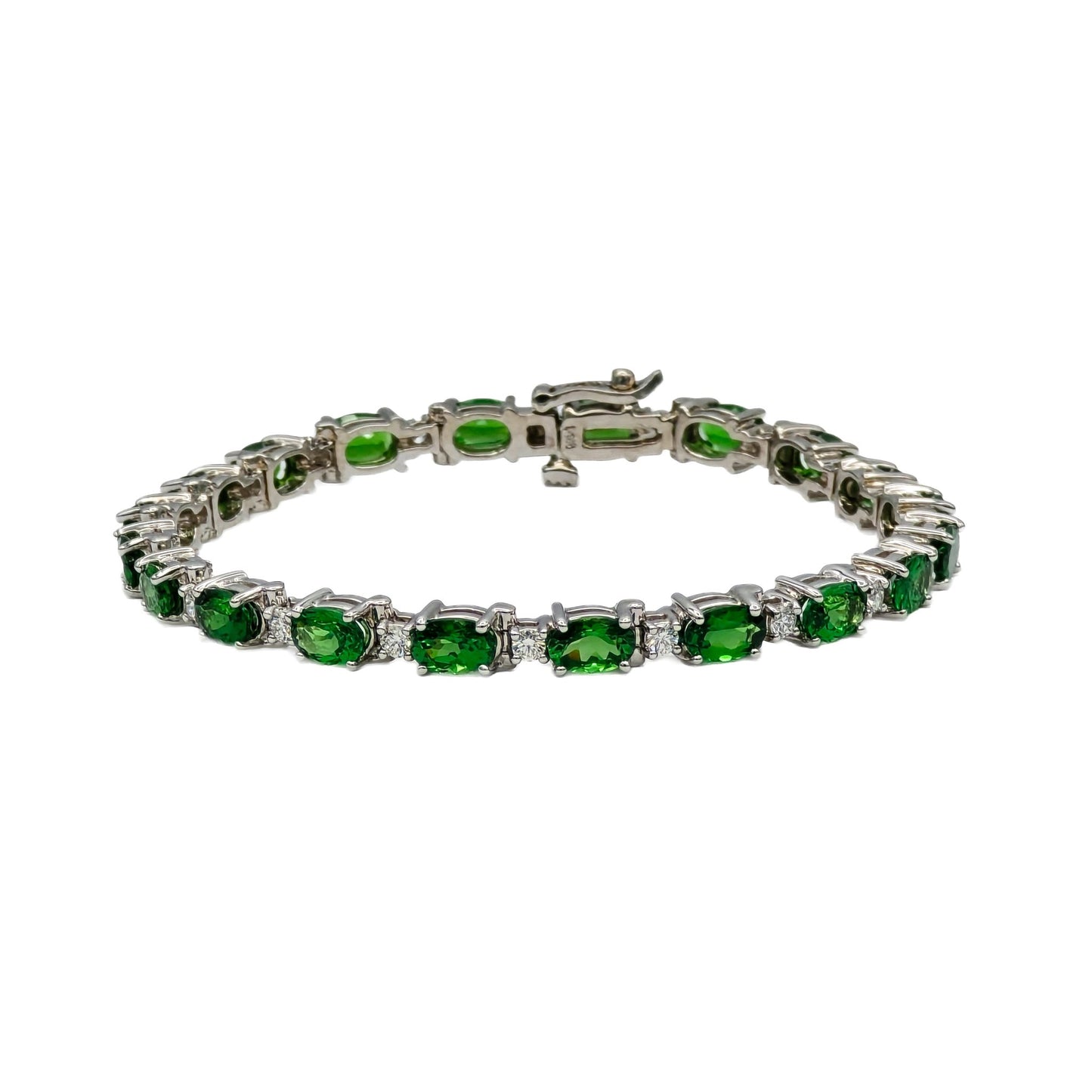 9.97 Carat oval tsavorite garnet and diamond bracelet in 14K white gold