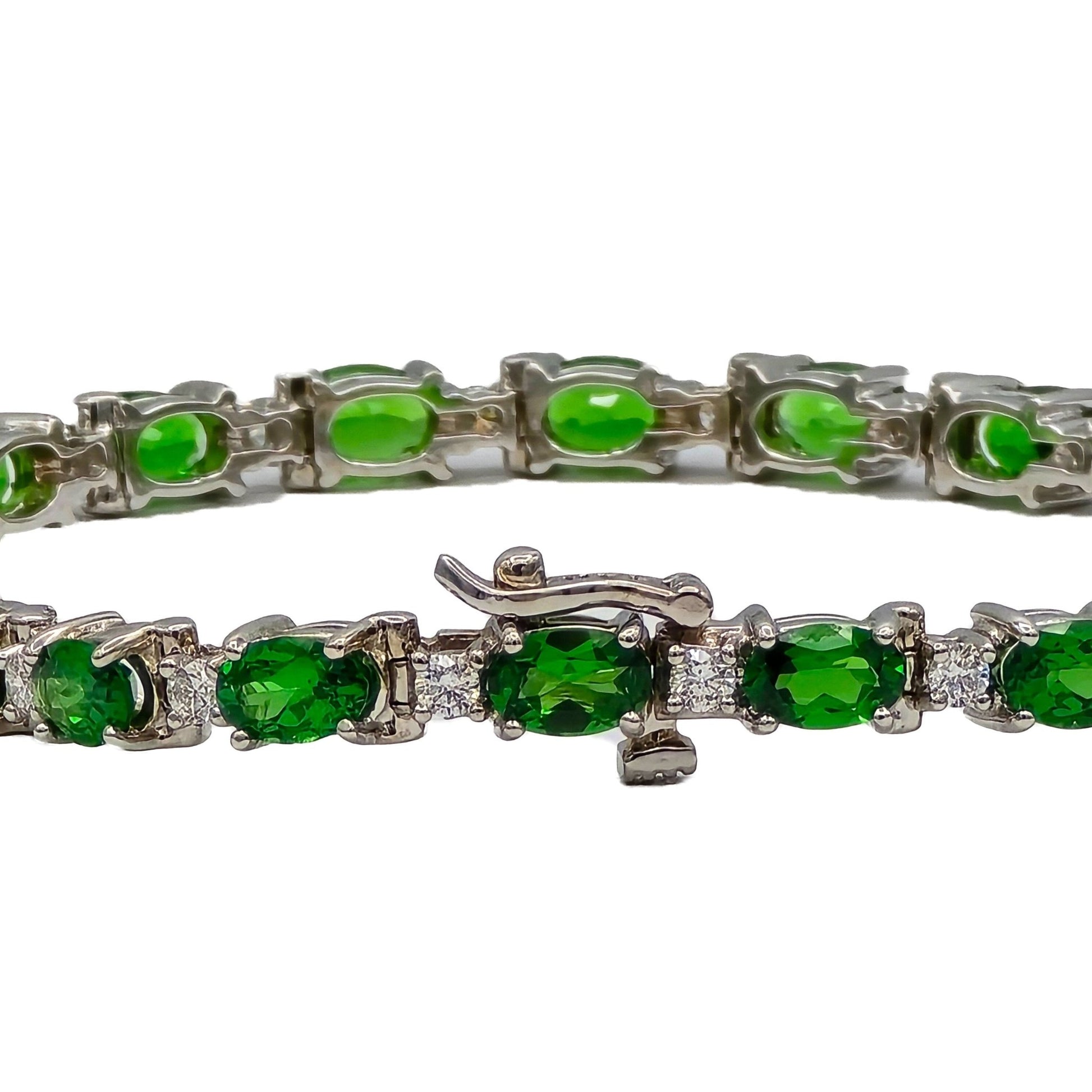 closeup of tsavorite garnet and diamond bracelet