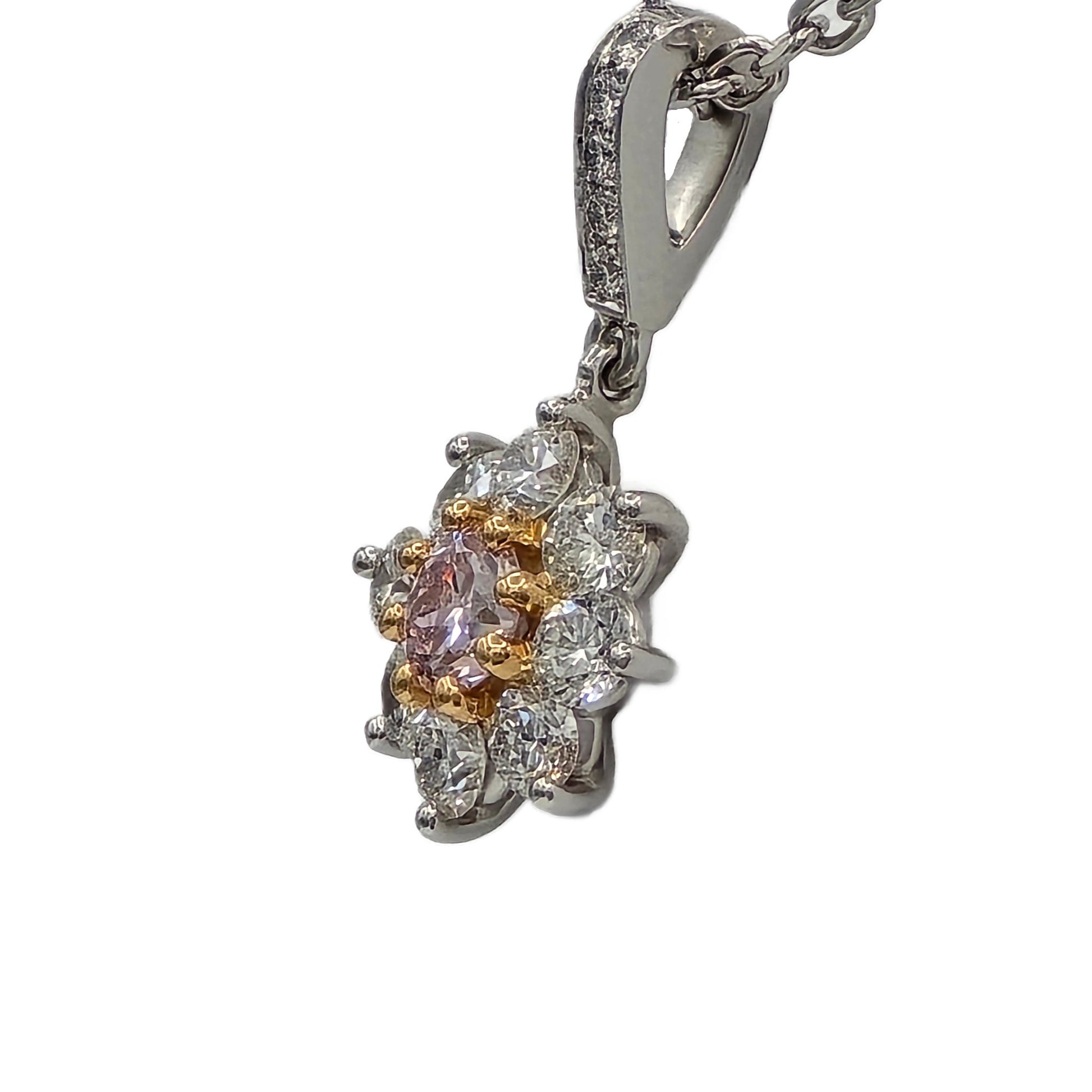 0.24 Carat Pink Diamond and 0.57Ctw white diamond pendant in platinum