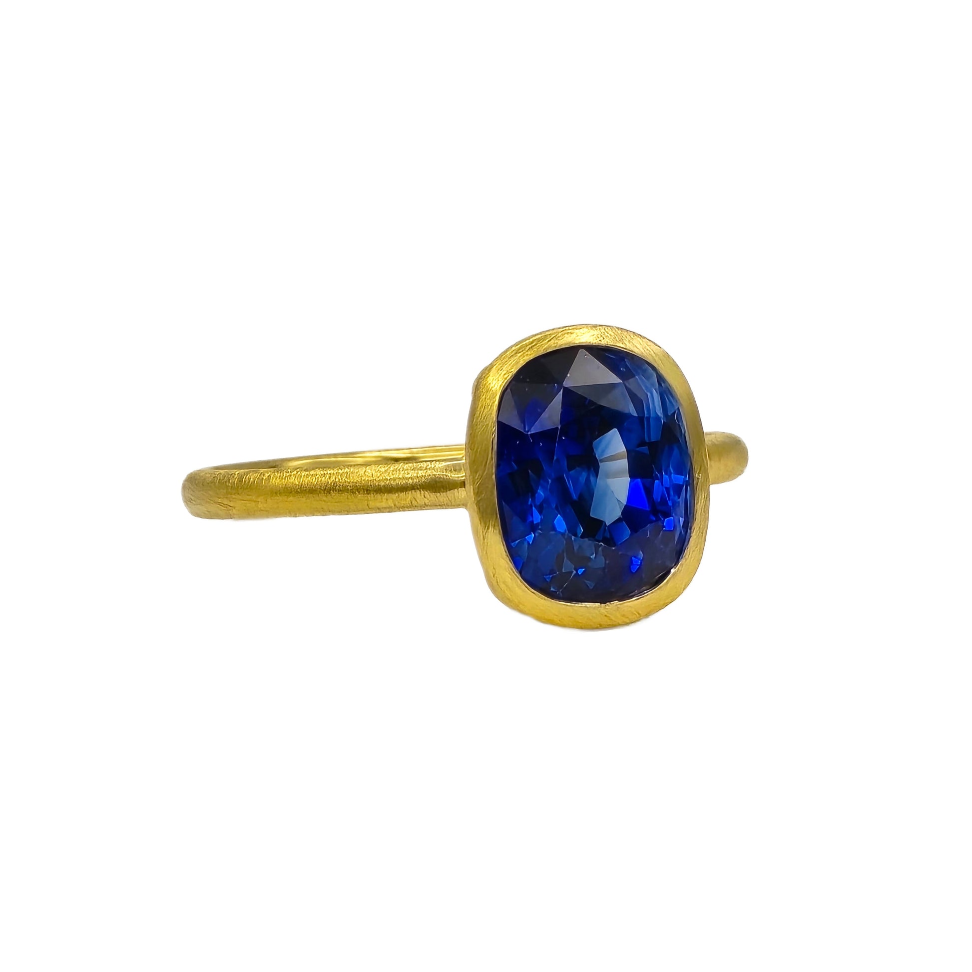 3.91 Carat Blue Sapphire Bezel Set Ring in 18K gold