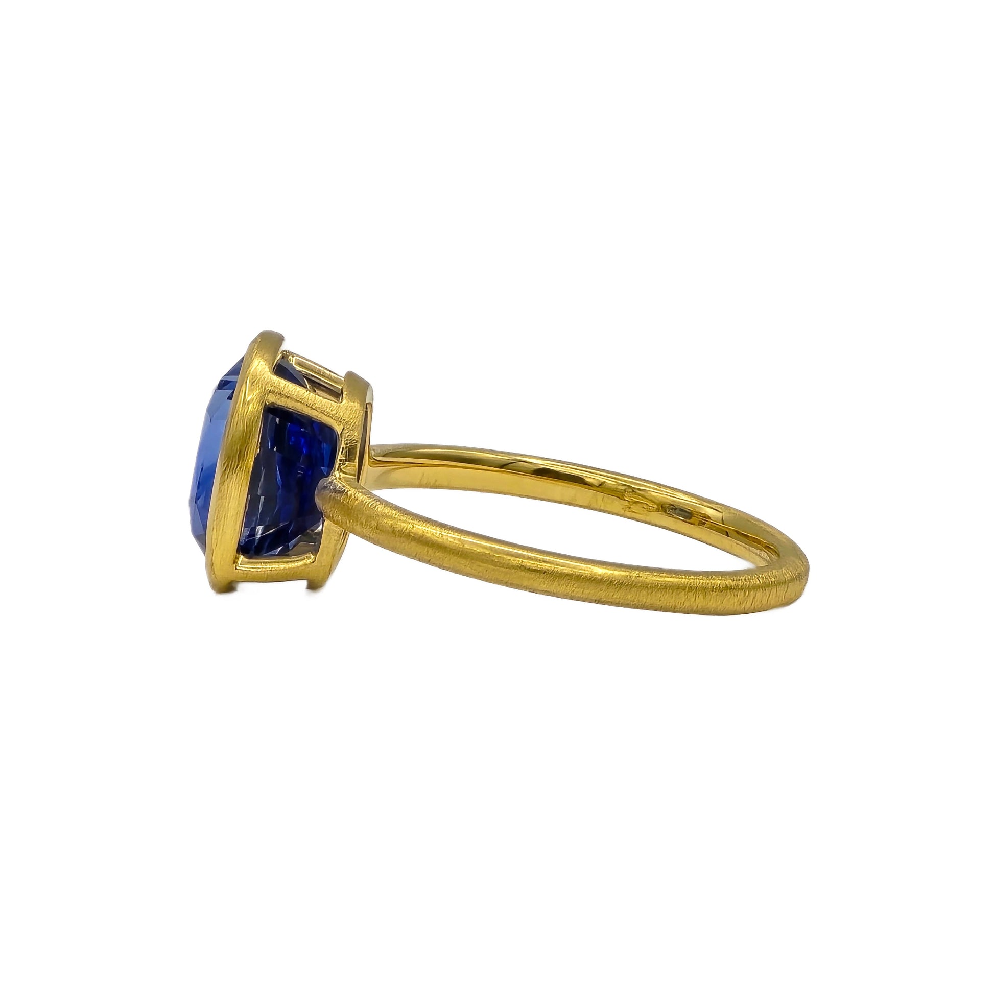 3.91 Carat Blue Sapphire Bezel Set Ring in 18K gold