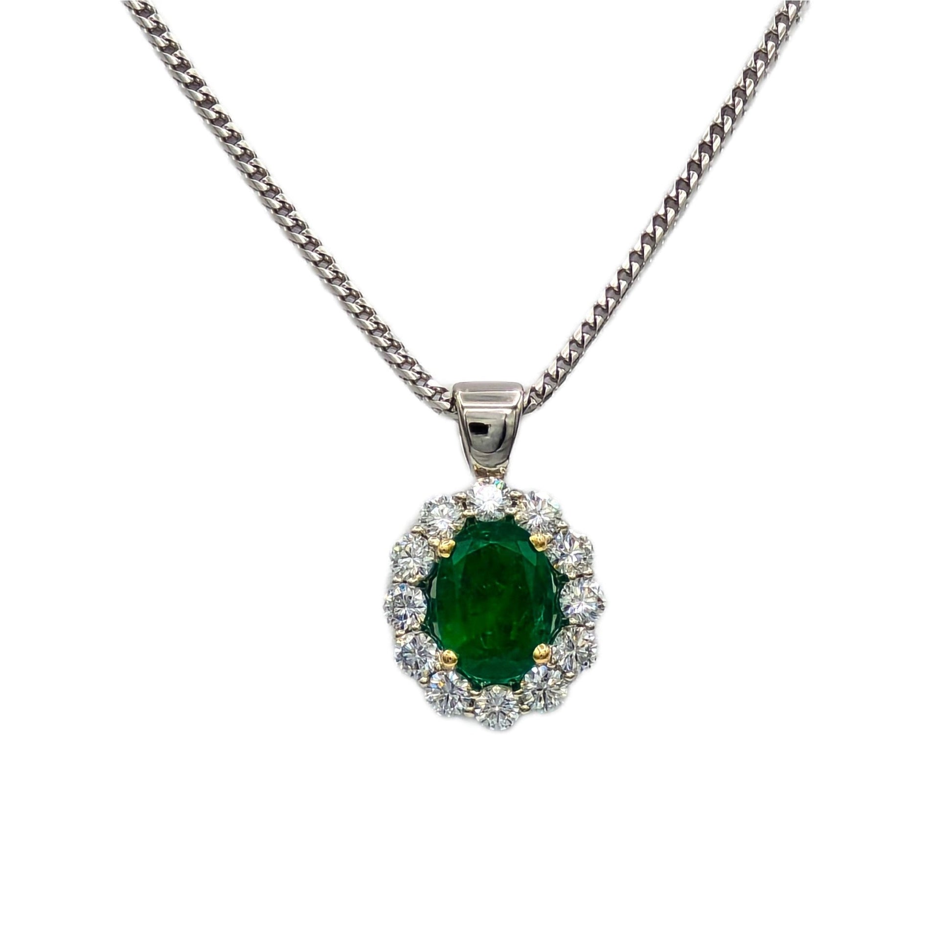 2.19 Carat Oval Emerald and 1.22 Carat total weight Diamond Pendant